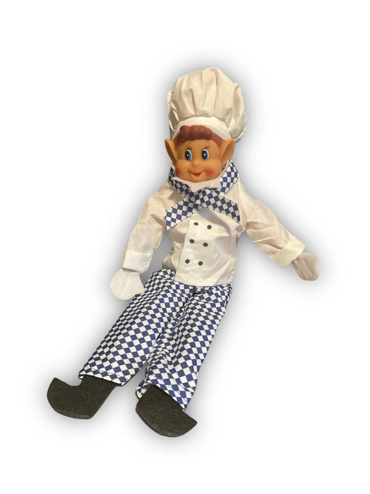Lutin habillé en chef cuisinier, toque blanche et pantalon à carreaux bleus, sur fond blanc