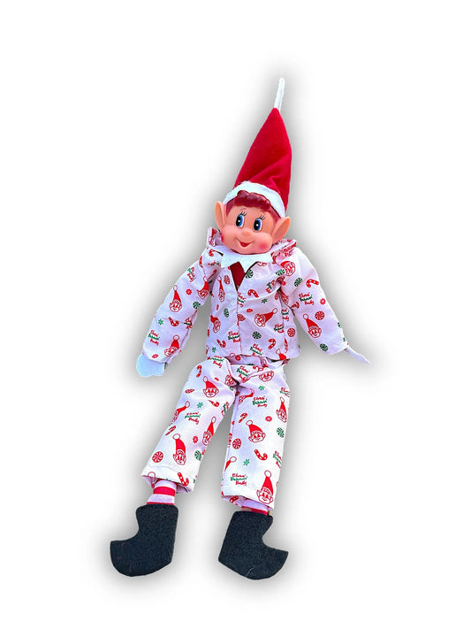 Poupée lutin en pyjama blanc à motifs de Noël rouges, bonnet pointu et grandes bottes noires