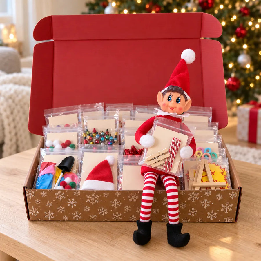 La box ouverte avec les 24 sachets de bêtises prêts, le lutin assis dessus